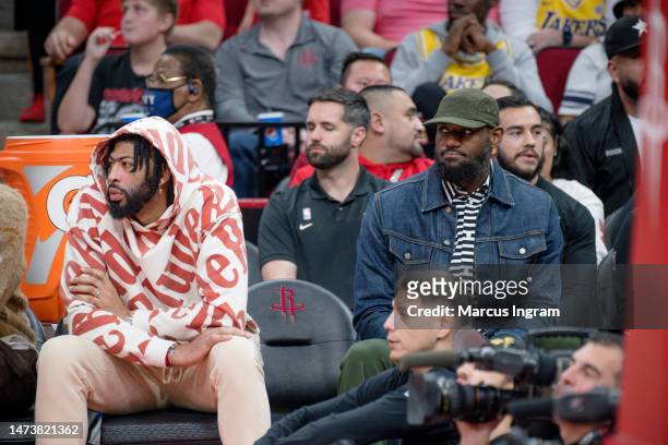 Anthony Davis and LeBron James attend the game between the Los Angeles Lakers and the Houston Rockets at Toyota Center on March 15, 2023 in Houston,...