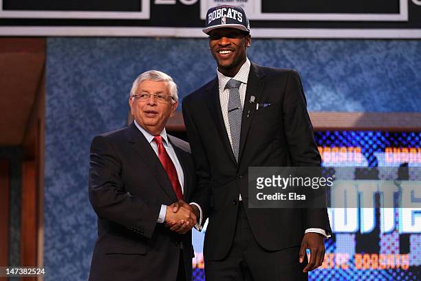 Michael Kidd-Gilchrist of the Kentucky Wildcats greets NBA Commissioner David Stern after he was selected number two overall by the Charlotte Bobcats...