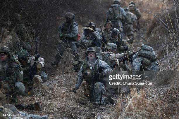 Soldiers from the 2nd Infantry Division participate in a joint Freedom Shield exercise with South Korean soldiers on March 16, 2023 in Paju, South...