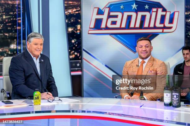 Conor McGregor visits "Hannity" with host Sean Hannity at Fox News Channel Studios on March 15, 2023 in New York City.