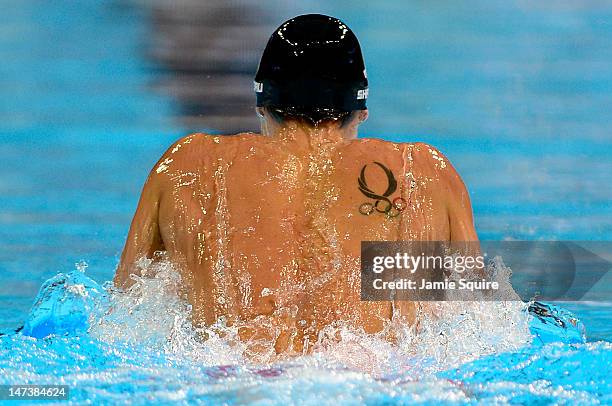 Detail of the tattoo and back of Eric Shanteau as he competes in the second semifinal heat of the Men's 200 m Breaststroke during Day Four of the...