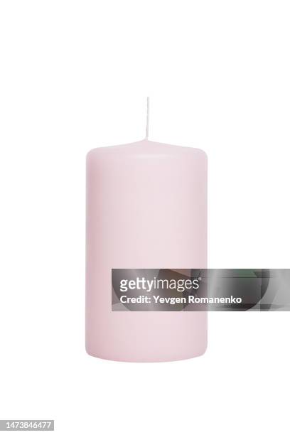pink candle isolated on white background - candle photos et images de collection