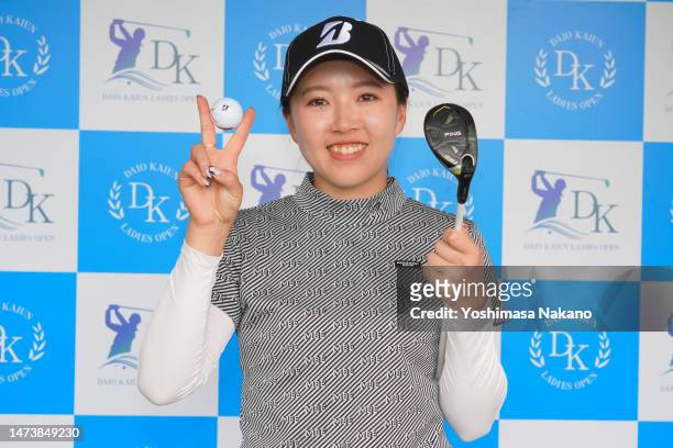Moeno Tan of Japan poses after the first round of DAIO KAIUN Ladies Open as she made a hole-in-one on the 3rd hole at elleair Golf Club Matsuyama on...