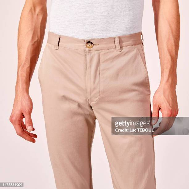 men's pant top - beige pants stock pictures, royalty-free photos & images