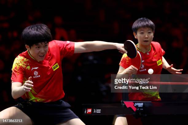 Wang Chuqin and Sun Yingsha of China return the ball against Tomokazu Harimoto and Hina Hayata of Japan in the mixed doubles final during the WTT...