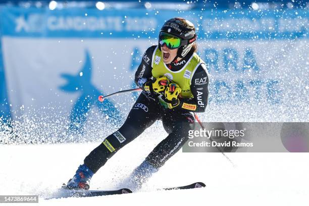 Federica Brignone of Italy celebrates after crossing the finish line in the Women's Super G during the Audi FIS Alpine Ski World Cup Finals on March...