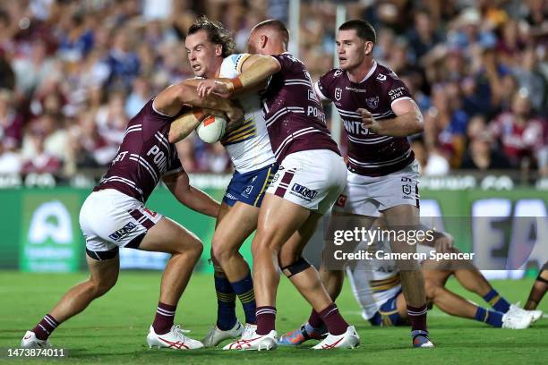 Clint Gutherson of the Eels is tackled during the round three NRL match between Manly Sea Eagles and Parramatta Eels at 4 Pines Park on March 16,...