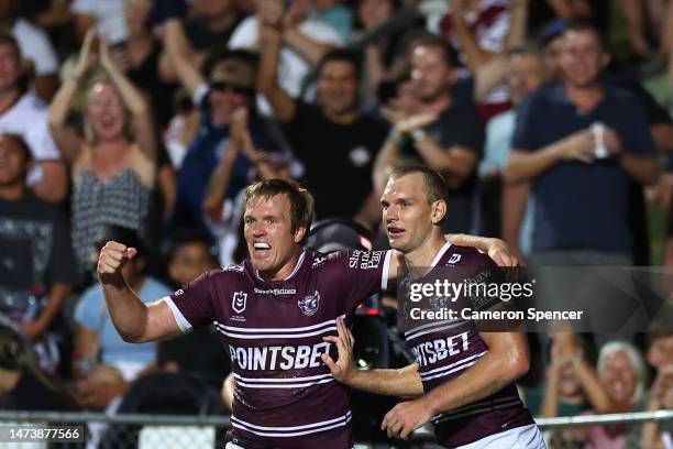 Tom Trbojevic of the Sea Eagles celebrates with Jake Trbojevic of the Sea Eagles after scoring a try during the round three NRL match between Manly...