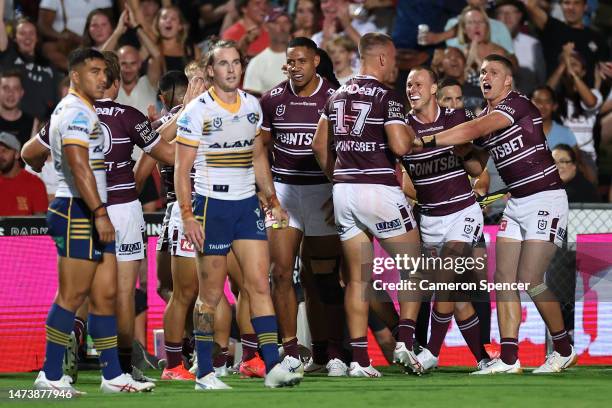 Sea Eagles players celebrate the try scored by Brad Parker during the round three NRL match between Manly Sea Eagles and Parramatta Eels at 4 Pines...