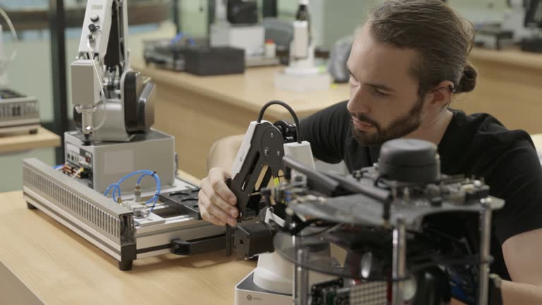 Robotics Engineer Lab 1,455 Man In Robotics Lab Stock Videos, Footage, & 4K Video Clips ...