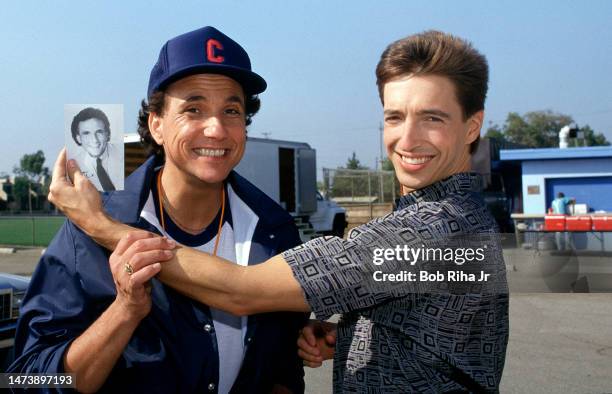 Ron Reagan Jr. With Actor Henry Polic during a break while filming on location a segment of television show 'Webster', October 16, 1986 in Los...