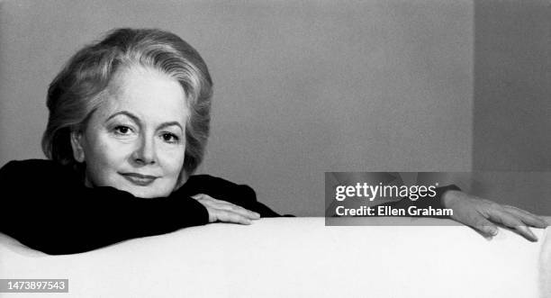 Portrait of British-American actor Olivia de Havilland on a couch, Beverly Hills, California, 1981.
