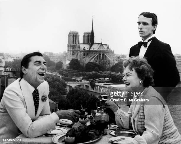 British-American actor Olivia de Havilland and French restaurateur Claude Terrail owner of La Tour d'Argent, Paris, France, 1980.
