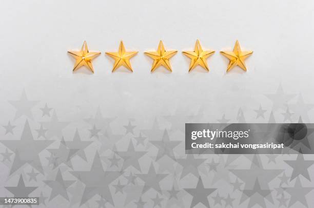 concept of excellence, gold stars, five stars, best seller - 5 stars stockfoto's en -beelden