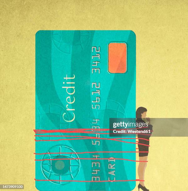 woman tied up to oversized credit card - debt stock illustrations