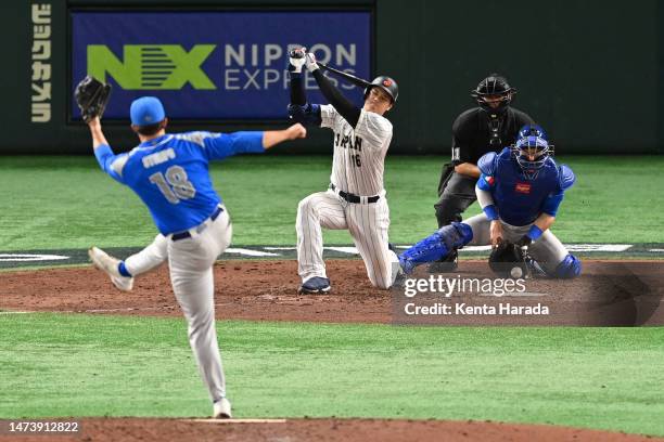 Shohei Ohtani of Japan strikes out in the eighth inning during the World Baseball Classic quarterfinal between Italy and Japan at Tokyo Dome on March...