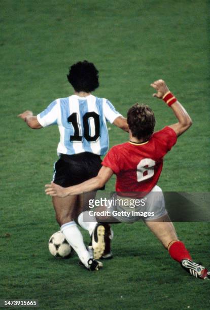 Argentina player Diego Maradona is challenged by Belguim player Franky Vercauteren during the 1982 FIFA World Cup match between Argentina and Belguim...