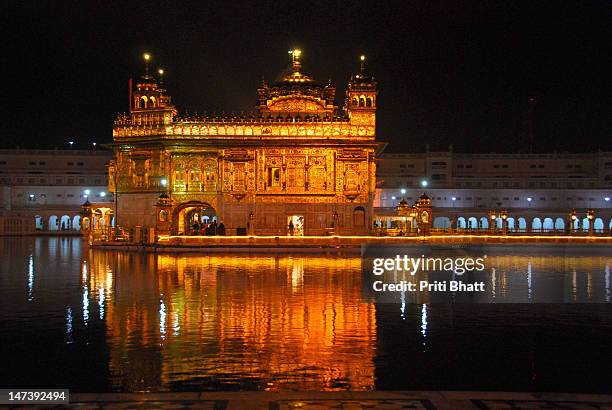 midnight view of temple - priti bhatt stock-fotos und bilder