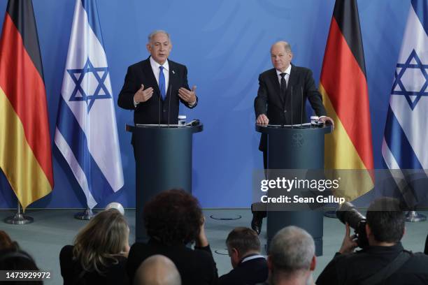 German Chancellor Olaf Scholz and Israeli Prime Minister Benjamin Netanyahu speak to the media following talks at the Chancellery on March 16, 2023...