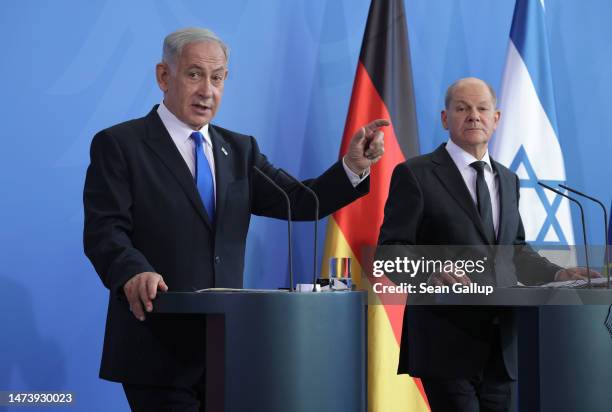 German Chancellor Olaf Scholz and Israeli Prime Minister Benjamin Netanyahu speak to the media following talks at the Chancellery on March 16, 2023...