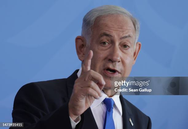 Israeli Prime Minister Benjamin Netanyahu and German Chancellor Olaf Scholz speak to the media following talks at the Chancellery on March 16, 2023...