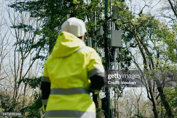 Engineer Testing Signal Path 5g Communication Engineer Is Checking The Signal Base Station High-Res ...