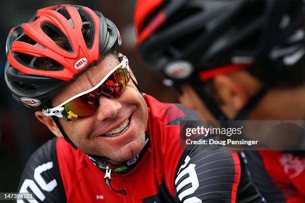 Defending champion Cadel Evans of Australia riding for BMC Racing chats with teammate George Hincapie of the USA before commencing a training ride in...