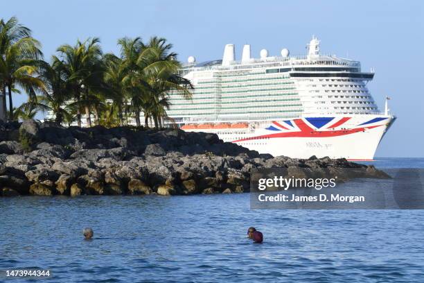 Local swimmers in the water as P&O Cruises newest ship Arvia arrives close to Heywoods Beach on March 16, 2023 in Bridgetown, Barbados. Nicole...
