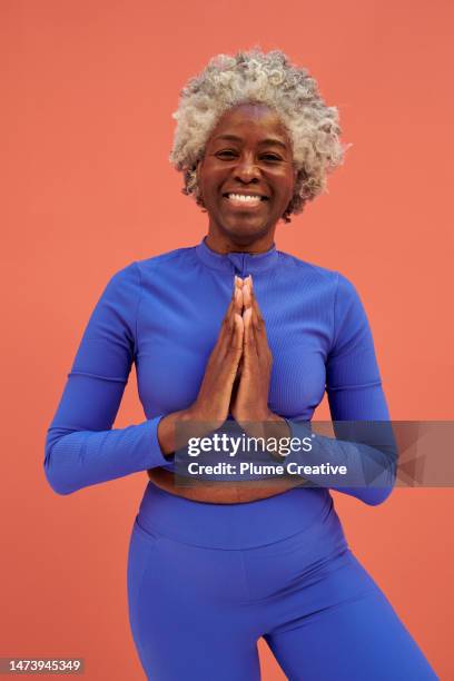 senior woman exercising - senior yoga lady stock pictures, royalty-free photos & images