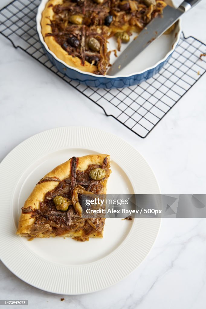 Pissaladiere onion pie with anchovies and black olives The cut off