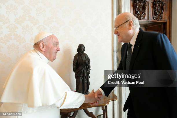 Pope Francis meets Prime Minister of Lebanon Najib Azmi Mikati at his private library of the Apostolic Palace on March 16, 2023 in Vatican City,...