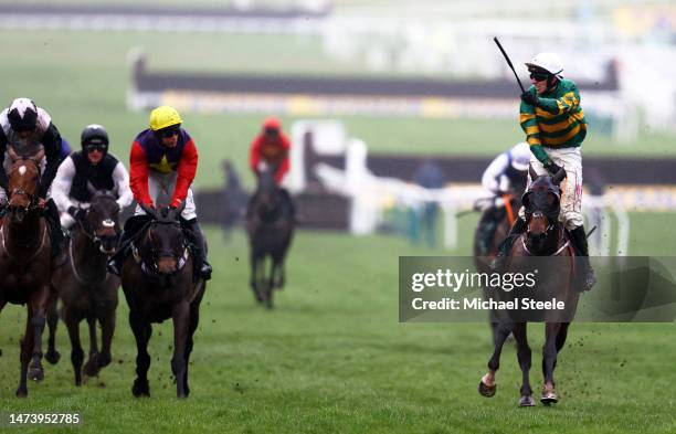 Mark Walsh celebrates on board Sire Du Berlais after winning the Paddy Power Stayers Hurdle during day three of the Cheltenham Festival 2023 at...