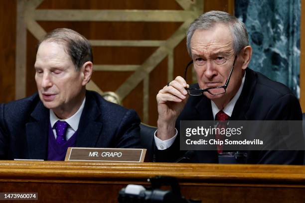 Senate Finance Committee ranking member Sen. Mike Crapo and Chairman Ron Wyden listen to U.S. Treasury Secretary Janet Yellen testify about the Biden...