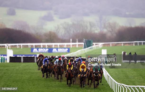 Runners make their way around the course during the Jack de Bromhead Mares Novices Hurdle during day three of the Cheltenham Festival 2023 at...