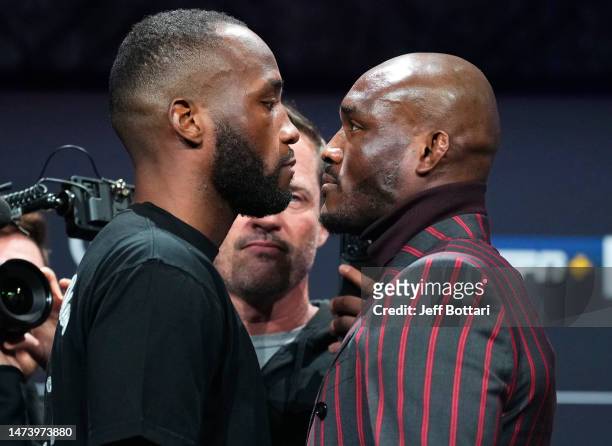Opponents Leon Edwards of Jamaica and Kamaru Usman of Nigeria face off during the UFC 286 press conference at Magazine London on March 16, 2023 in...