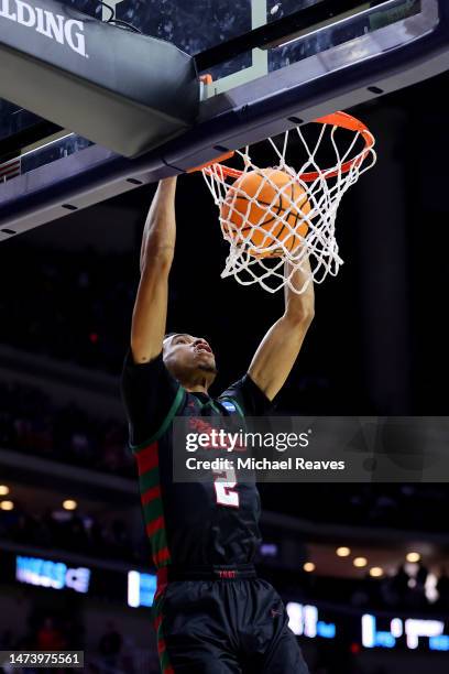 Steve Settle III of the Howard Bison dunks against Kansas Jayhawks during the first half in the first round of the NCAA Men's Basketball Tournament...