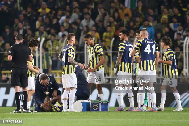 Michy Batshuayi of Fenerbahce reacts as they receive medical treatment before leaving the pitch on a stretcher during the UEFA Europa League round of...