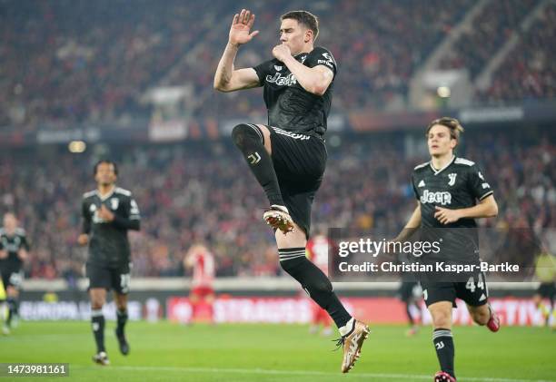 Dusan Vlahovic of Juventus celebrates scoring the side's first goal from the penalty spot during the UEFA Europa League round of 16 leg two match...