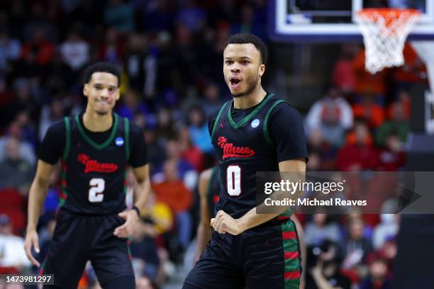 Marcus Dockery of the Howard Bison celebrates scoring a three point basket against Kansas Jayhawks during the first half in the first round of the...