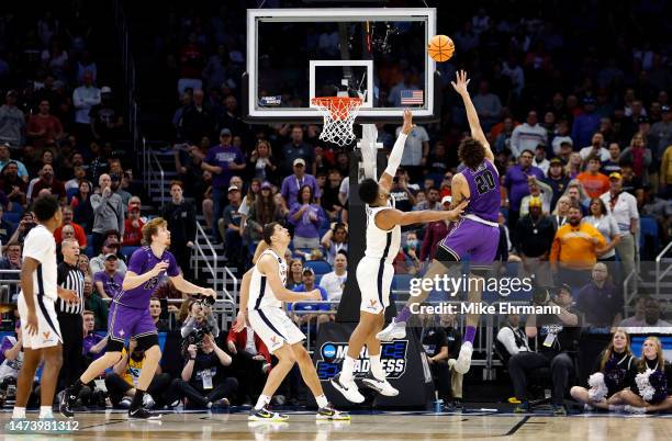 Jalen Slawson of the Furman Paladins shoots the ball against the Virginia Cavaliers during the second half in the first round of the NCAA Men's...