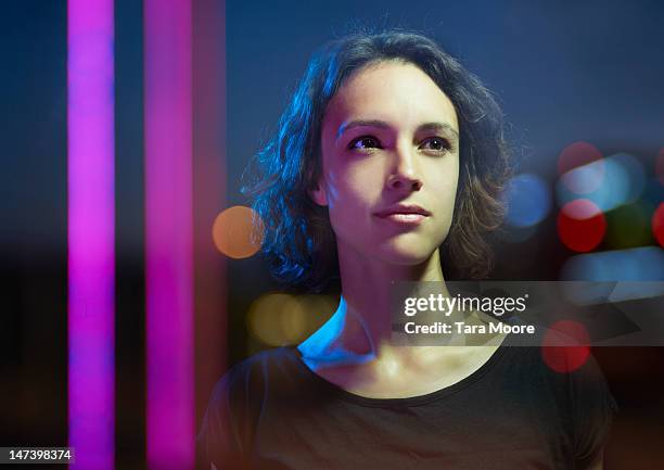 portrait of woman in night time scene - think idea stock pictures, royalty-free photos & images