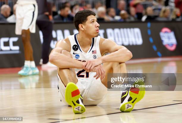 Kadin Shedrick of the Virginia Cavaliers looks dejected following defeat against the Furman Paladins in the first round of the NCAA Men's Basketball...