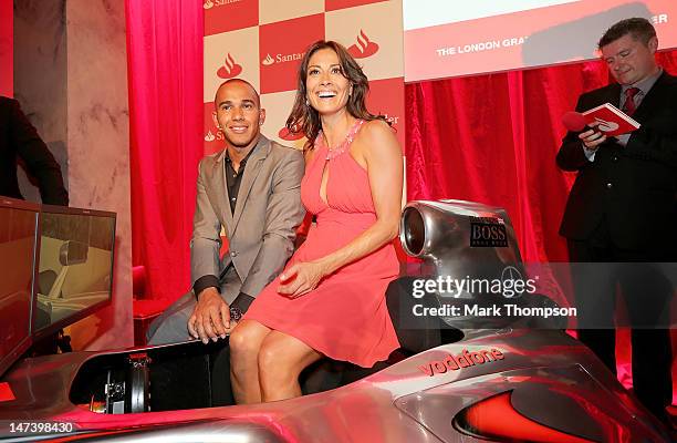 Driver Lewis Hamilton, TV presenter Melanie Sykes and Sky Sports F1 HD Commentator David Croft attend the launch of the London Grand Prix by...