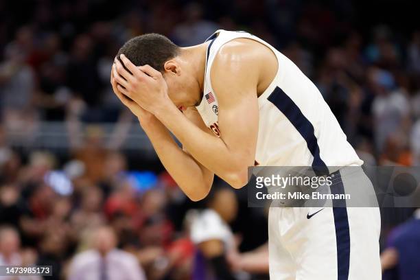 Kadin Shedrick of the Virginia Cavaliers reacts against the Furman Paladins during the second half in the first round of the NCAA Men's Basketball...