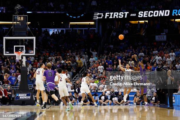 Pegues of the Furman Paladins shoots the game winning three point basket against the Virginia Cavaliers during the second half in the first round of...