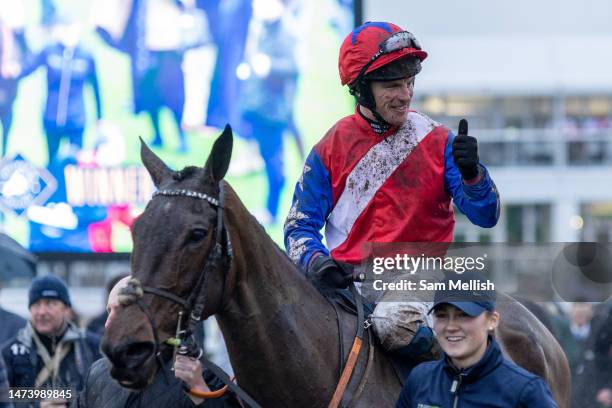 Jockey, Mr P A King on Angels Dawn enters the Parade Ring following winning the Fulke Walwyn Kim Muir Challenge Cup Handicap Steeple Chase during day...