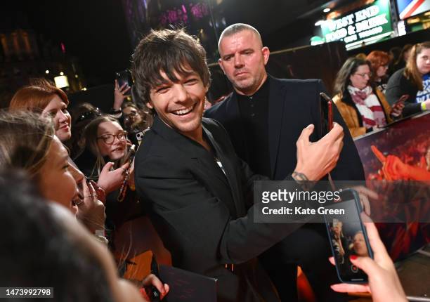 Louis Tomlinson arrives at the "All Of Those Voices" UK Premiere at Cineworld Leicester Square on March 16, 2023 in London, England.