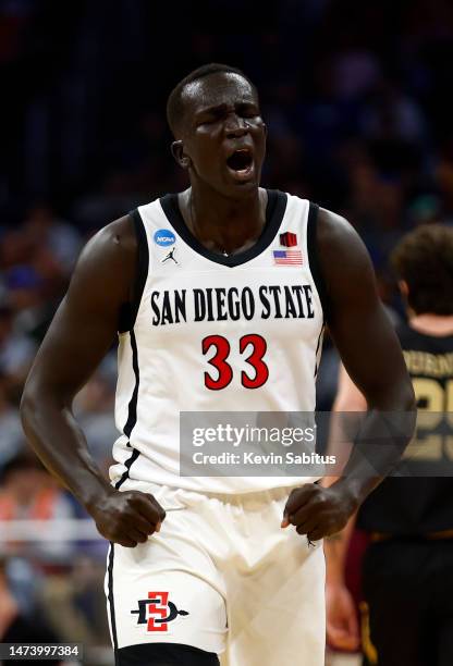 Aguek Arop of the San Diego State Aztecs celebrates against the Charleston Cougars during the first half in the first round of the NCAA Men's...