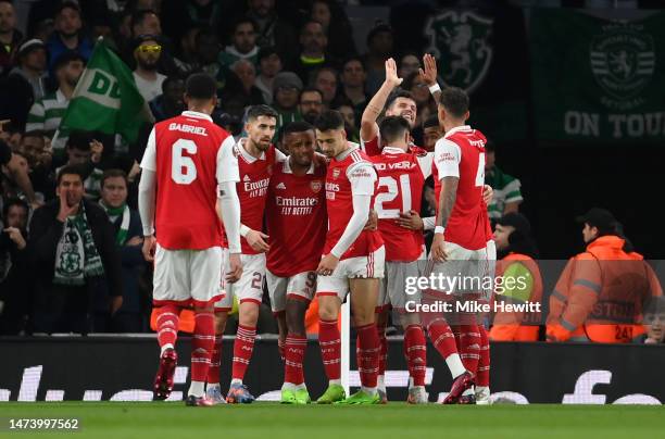 Granit Xhaka of Arsenal celebrates after scoring the team's first goal with team mates during the UEFA Europa League round of 16 leg two match...