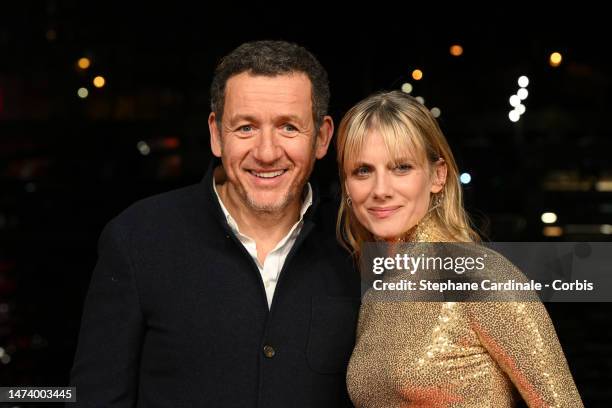 Dany Boon and Mélanie Laurent attend the "Murder Mystery 2" photocall at Pont Debilly on March 16, 2023 in Paris, France.